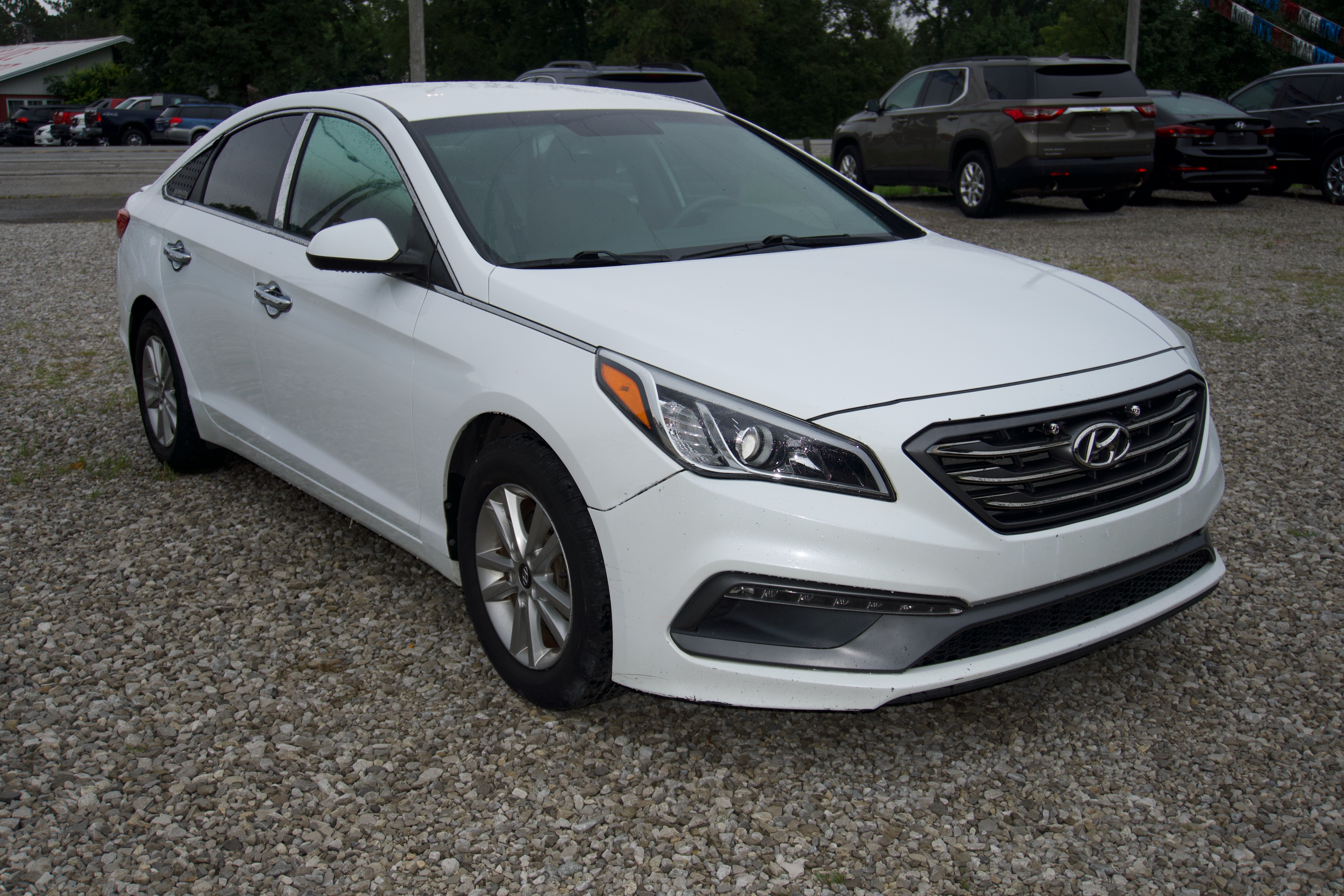 White 2016 Hyundai Sonata SE side profile