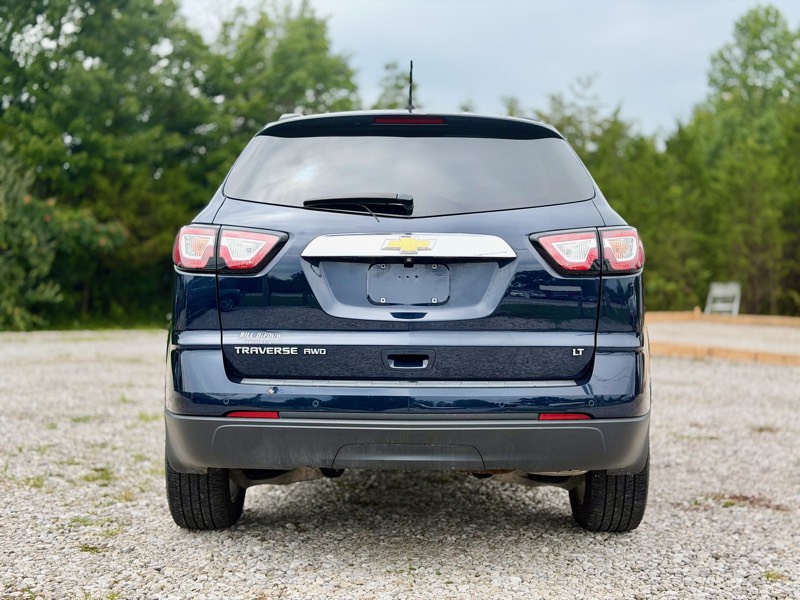 Navy blue Chevrolet Traverse LT AWD, rear straight-on view showing Traverse AWD badge